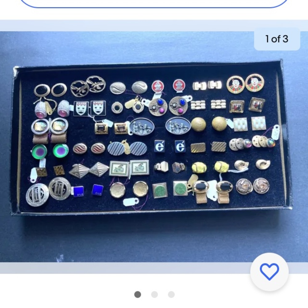 Lot of 35 vintage assorted cufflinks. Includes a display box.